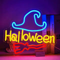 Halloween witch hat neon sign with cyan hat, yellow Halloween text and red broomstick on clear acrylic backing